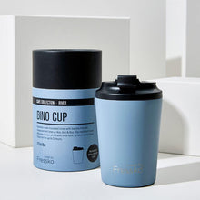Insulated Made by Fressko stainless steel coffee cup in a beautiful baby blue river colour with packaging in the background.