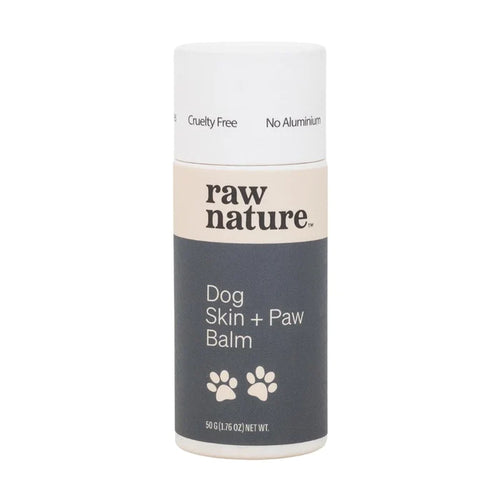 Dog skin and paw balm from Raw Nature. White cardboard tube with Raw Nature logo and two paw prints on the front. Text reads 