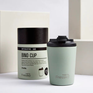 Made by Fressko reusable 8oz Bino coffee cup in Sage green colour with packaging in the background.