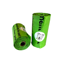 Two single rolls of Little Green Dog certified home compostable dog poo bags with a little picture of a dog.