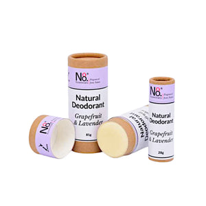 Natural deodorant from No. 8 Essentials in Grapefruit and Lavender fragrance with home compostable packaging. 28g and 85g sizes shown and one deodorant is open exposing the roll-on deodorant.