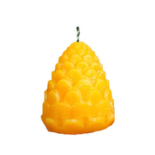 Natural beeswax candle in pine cone shape, handmade with natural wicks and beeswax from Canterbury hives.