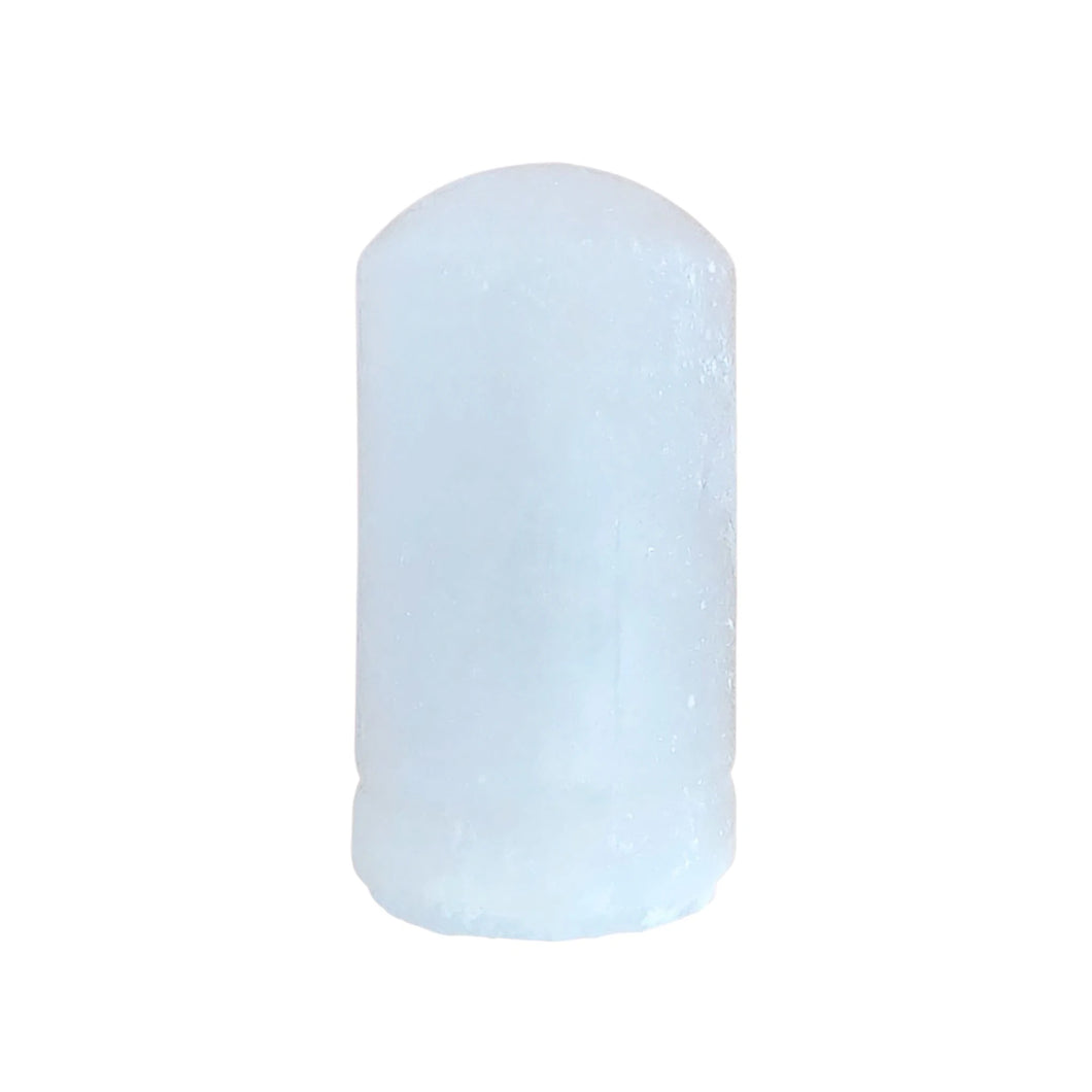 Natural body crystal rock deodorant stone in a round cylinder shape with a rounded top.  