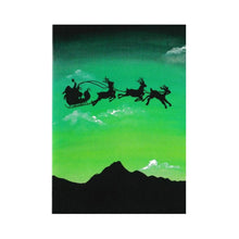 Christmas Greeting Card, green sky with a black silhouette of Santa's sleigh passing over top of a mountain peak. Christmas fundraiser for Fountain of Peace Childrens Foundation.