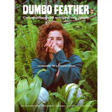 Dumbo Feather Magazine Issue 72. Leadership for a hopeful future. Conversations with extraordinary people. Woman looking happy sitting in a background of lush dark green foliage which fills the magazine cover.
