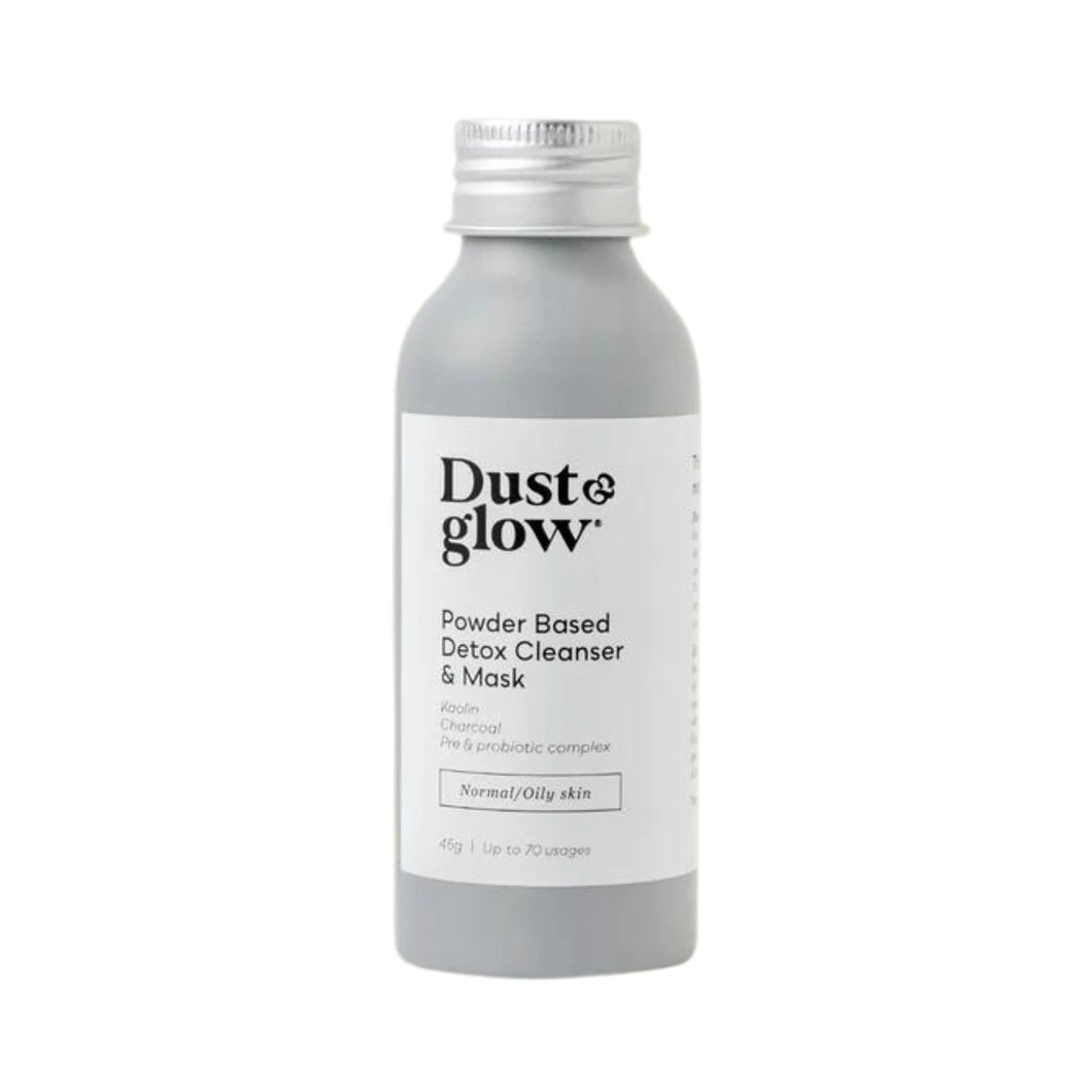 Dust & Glow powder based detox cleanser and facemask. Seen here in a recyclable grey aluminium bottle with a white lable.