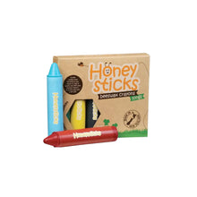 Honeysticks natural beeswax crayons in long size, sustainable cardboard box packaging containing 8 different colours. Made in Aotearoa New Zealand.