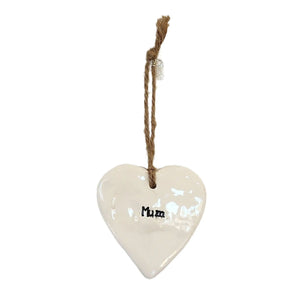 A beautiful glossy hanging heart embossed with the letters "Mum". The heart has a jute string attached to hang your heart up with.