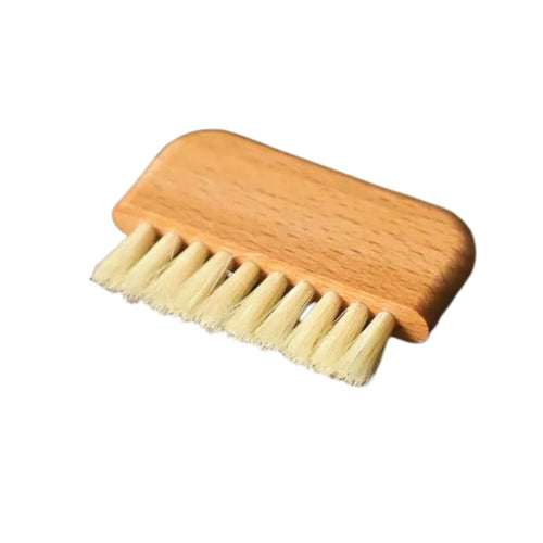 Natural wooden nail brush made from white boar bristles and beechwood.
