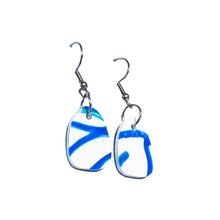Porcelain inspired white earrings with blue accents made from recycled single-use coffee cup lids by Remix Plastic.