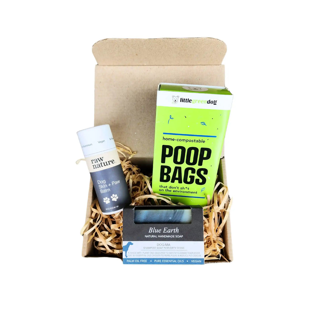 The Dog Box eco friendly gift box for your pet, containing 60 dog poop bags, a dog skin and paw balm and a dog shampoo bar.