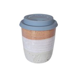 An espresso sized ceramic travel take-away coffee cup by Wellhandled Ceramics in a layered glaze with cream, white and pink layers, a slightly speckled clay and a grey coloured silicone lid.