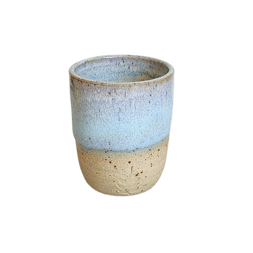 Ceramic espresso sized drinking tumbler handmade by Wellhandled Ceramics with a beachy coloured clay and a light sea foam glaze.