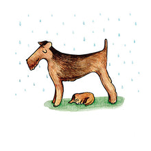 Greeting card featuring an Aierdale dog standing in the rain with a cute puppy sheltering underneath. Made in Ōtautahi, Christchurch, New Zealand.
