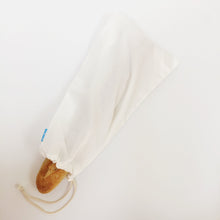 Large organic cotton loot bag containing baguette.