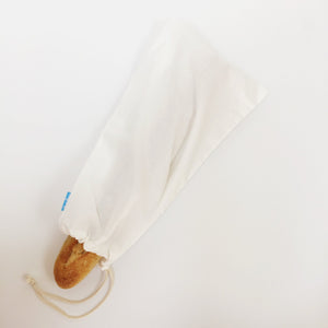 Large organic cotton loot bag containing baguette.