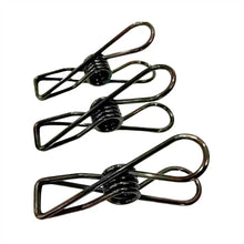Three high quality Bento Ninja marine grade stainless-steel metal clothes pegs in black colour.