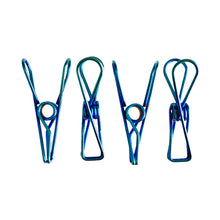 Four high quality Bento Ninja marine grade stainless-steel metal clothes pegs in an ocean blue colour.