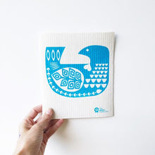 Compostable dish cloth with bird design.