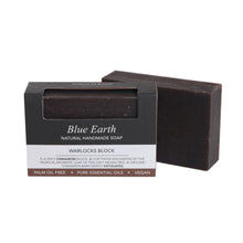 Blue Earth Warlocks Block Soap bar, pictured with one bar packaged and one bar standing to the right and slightly behind. Label reads: Natural Handmade soap.