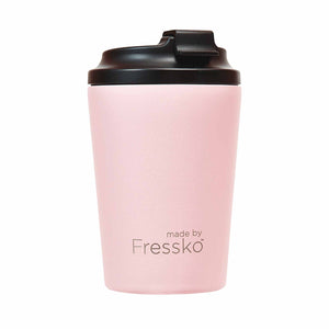 Reusable Made by Fressko floss (pink) stainless steel coffee cup with black plastic lid.