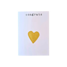 Sustainable greeting card which reads "Congrats" with a love heart underneath which is made from fabric and has been stitched onto the greeting card. Created from second-hand fabric which has been lovingly eco-dyed in Ōtautahi Christchurch by The Clothworks using local flora from our Garden City.