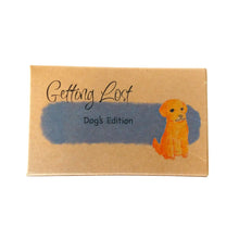 Dog's edition of the Getting Lost Adventure game in a kraft cardboard box with a blue cloud and a dog on the front.