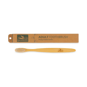 Adult bamboo toothbrush by Go Bamboo, made from natural bamboo wood, the toothbrush is pictured alongside its packaging - a recyclable cardboard box which reads Adult toothbrush, biodegradable handle and features the Go Bamboo logo.