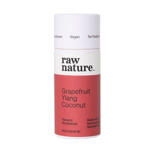 Raw Nature brand natural vegan deodorant in Grapefruit and Ylang Ylang scent. Seen here in a white cardboard tube with a salmon coloured label. Made in New Zealand.