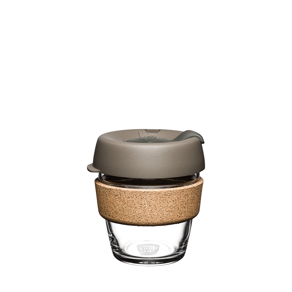 Extra Small reusable glass KeepCup coffee cup with sustainably sourced cork band in the Latte colour scheme which includes a Silver Brown lid and a Smoke coloured plug.