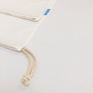 Large loot bag with braided drawstring detail.