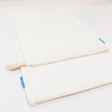 One medium and one large organic cotton loot bag.