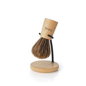 Natural shaving brush made from beech wood and horse hair with a wooden brush stand.