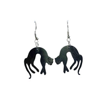 Pick-up black cats plastic earrings made from recycled ice-cream container lids by Remix Plastic.