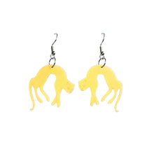 Pick-up gold cats plastic earrings made from recycled ice-cream container lids by Remix Plastic.
