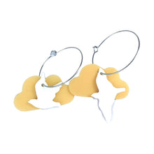 Eco friendly Flocking mixed Bird earrings made from recycled ice-cream container lids in Ōtautahi Christchurch by Remix Plastic. Hypoallergenic hooks which are silver in colour and a golden cloud with a white silhouette bird in front.