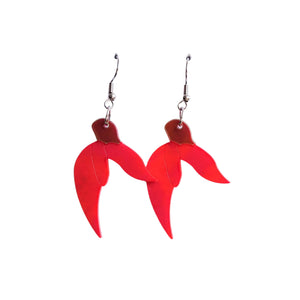 Remix Plastic Kākābeak flower earrings made from recycled plastic ice-cream container lids. Red flowers on hook style earrings, seen hanging on a white background.