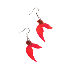 Remix Plastic Kākābeak flower earrings made from recycled plastic ice-cream container lids. Red flowers on hook style earrings, seen laying on a white background.