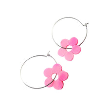 Remix Plastic's Mānuka flower earrings made from recycled 3D printer waste. Pink flowers with hoop closure, seen here laying on a white background.