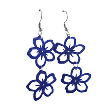 Remix Plastic earrings featuring double Forget-Me-Not flowers made from recycled ice-cream container lids in royal blue.