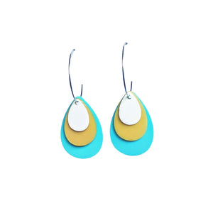 Mix and match light blue teardrop hoop earrings made from recycled plastic ice cream container lids by Remix Plastic.