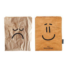 SammyBags reusable and washable paper bag with a smiley face pictured alongside a regular disposable paper bag with a sad face.
