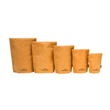 SammyBags stand-up food carrying pouches, seen here are all 5 sizes standing side by side in a row in the natural brown paper bag colour - Jumbo to small from left to right. The SammyBags logo is featured on the front along with a small origami crane.