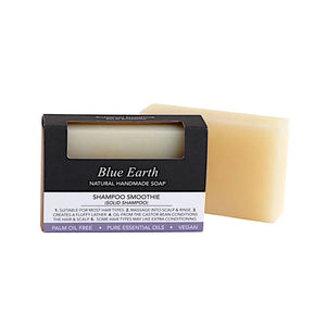 Blue Earth Shampoo Smoothie solid shampoo bar. Pictured with one shampoo bar in its box and one bar standing next to it without a box. Packaging reads: Natural handmade soap, Palm oil free, Pure essential oils, vegan, suitable for all hair types.
