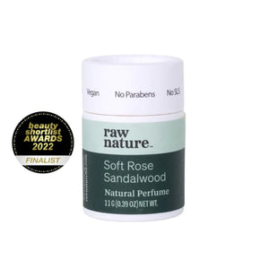Soft Rose and Sandalwood natural perfume by Raw Nature, packaging consists of white compostable cardboard tube and light and dark green striped label which reads "Vegan, No Parabens, No SLS". Next to the packaging is a Beauty Shortlist Awards 2022 Finalist logo.