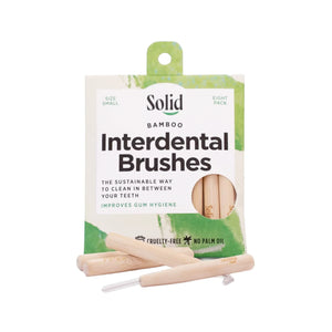 Interdental brushes from Solid Oral Care with compostable bamboo handles. 8 small size brushes in a compostable / recyclable cardboard packet which reads: "Improves gum hygiene" and "The sustainable way to clean in between your teeth".