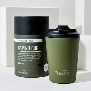 Durable stainless steel Camino coffee cup in Khaki Green colour, made by Fressko with packaging in the background.