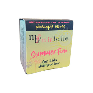 Summer Fun kids solid shampoo bar by Mia Belle. Packaging is brightly coloured with yellow and pinks, there are flowers and a sun drawn on the packing. A navy strip runs across the top and the text reads: Gentle on hair and scalp, ph balanced. Pineapple and mango.