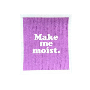 The Green Collective spruce compostable dish cloth in Make Me Moist design with purple background.