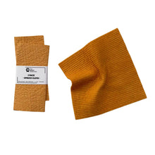 Two pack of 100% plant based, home compostable spruce dish cloth in mustard colour by The Green Collective.